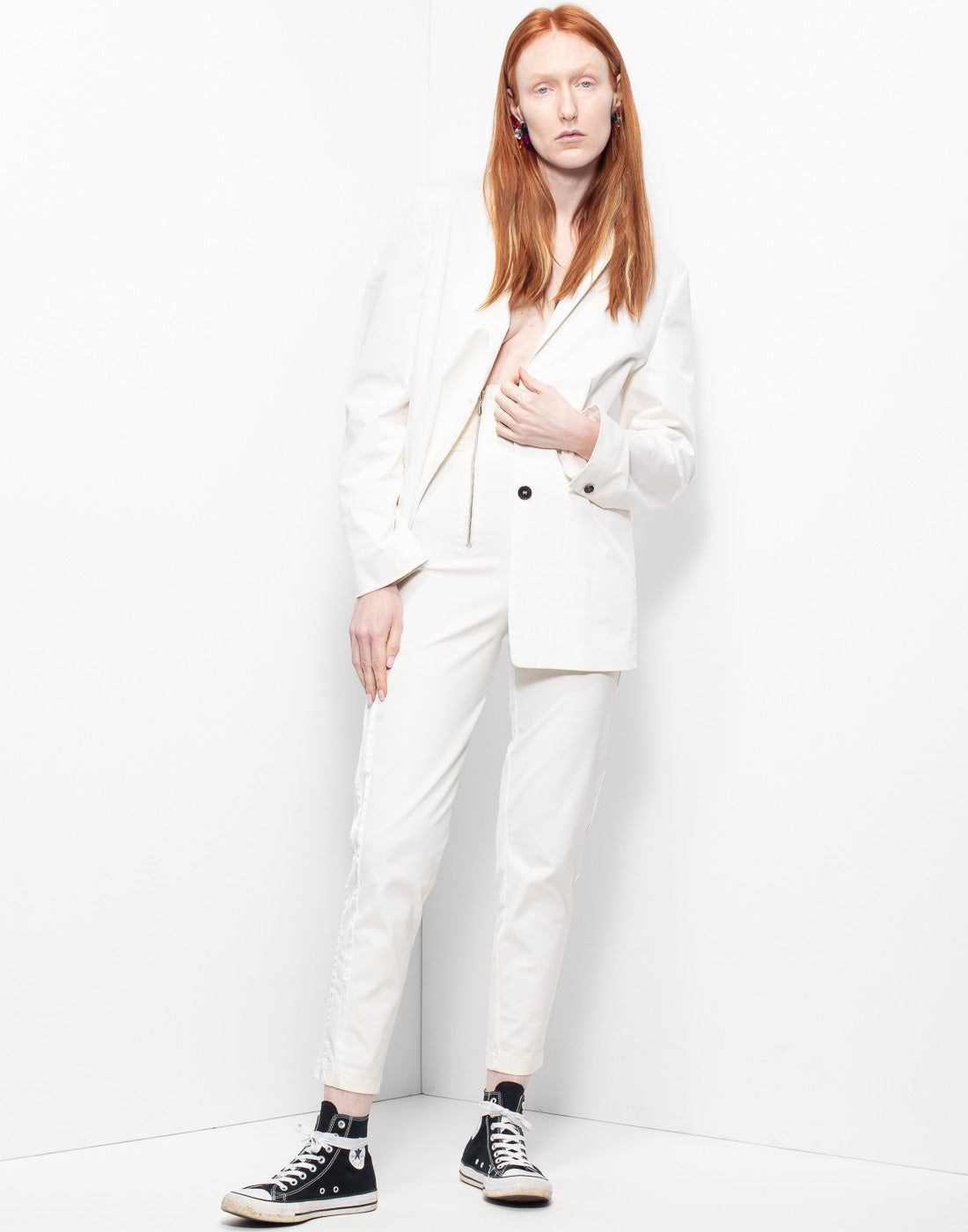 White pants with asymmetrically placed zipper from Girbaud Francois