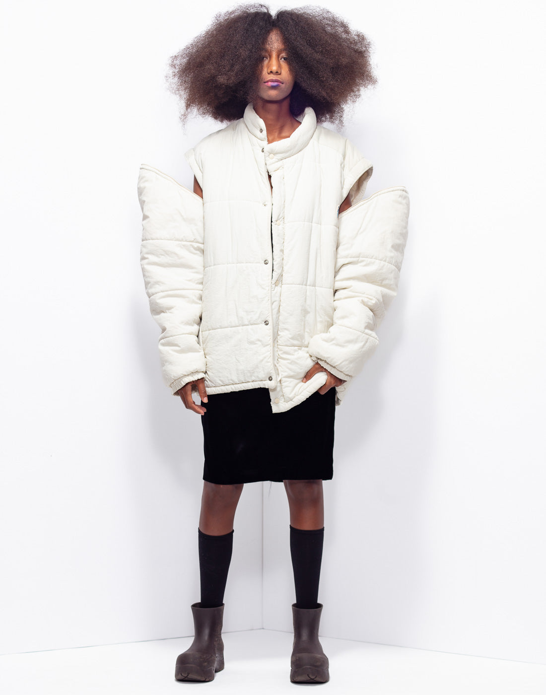 Vintage puffer jacekt that transforms in gilet